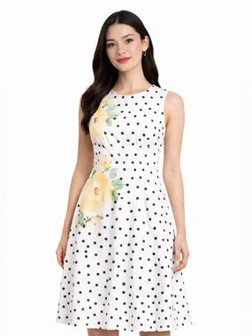 White dress with black polkadots. Large. No tags but never worn.